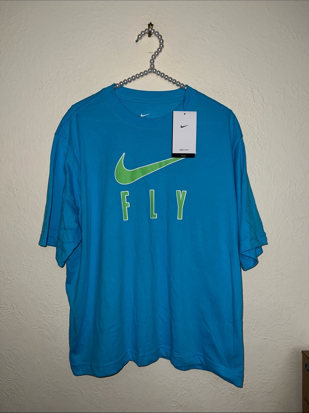 Nike womenโs L loose fit dri fit The Nike Tee nwt